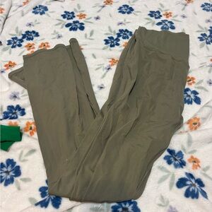 Green flared leggings